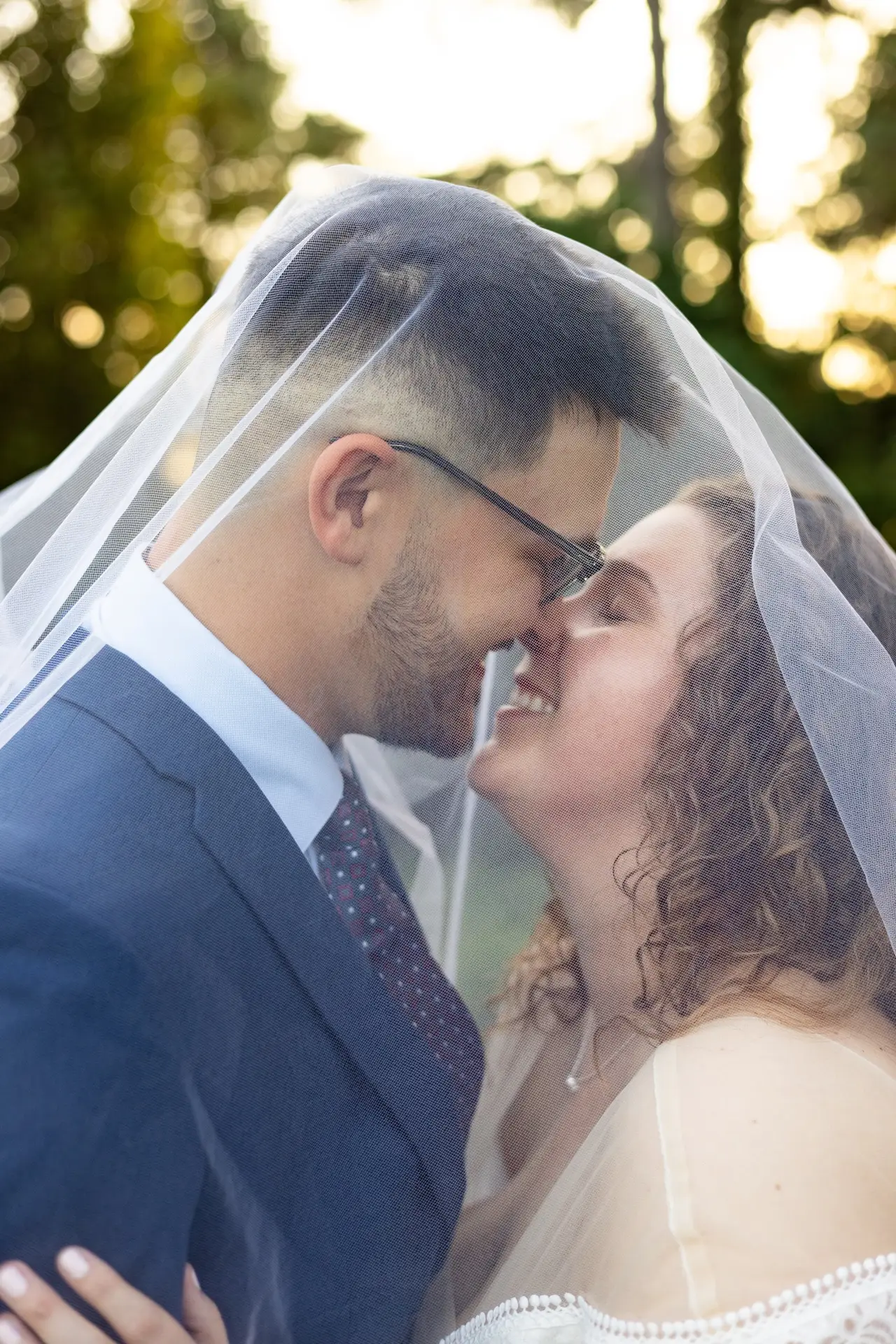 woman and man posing for a wedding photo