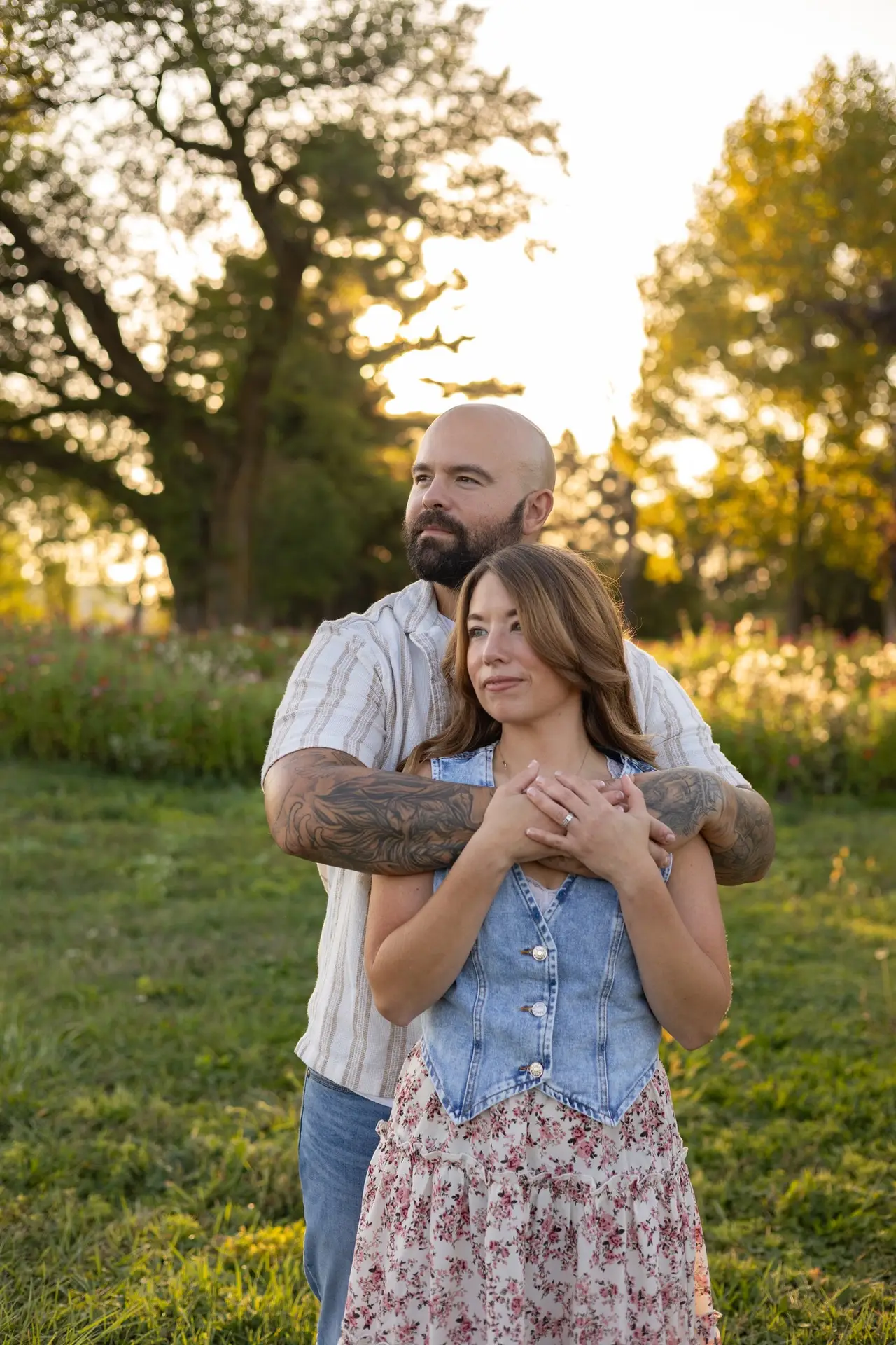 man and woman posing for a photo
