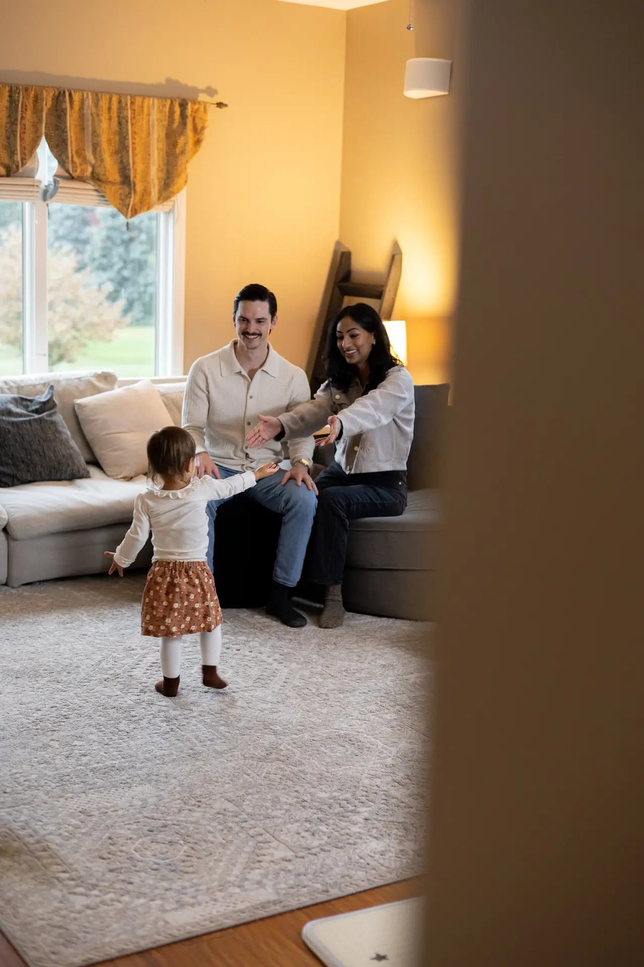 child reaching out to their mother