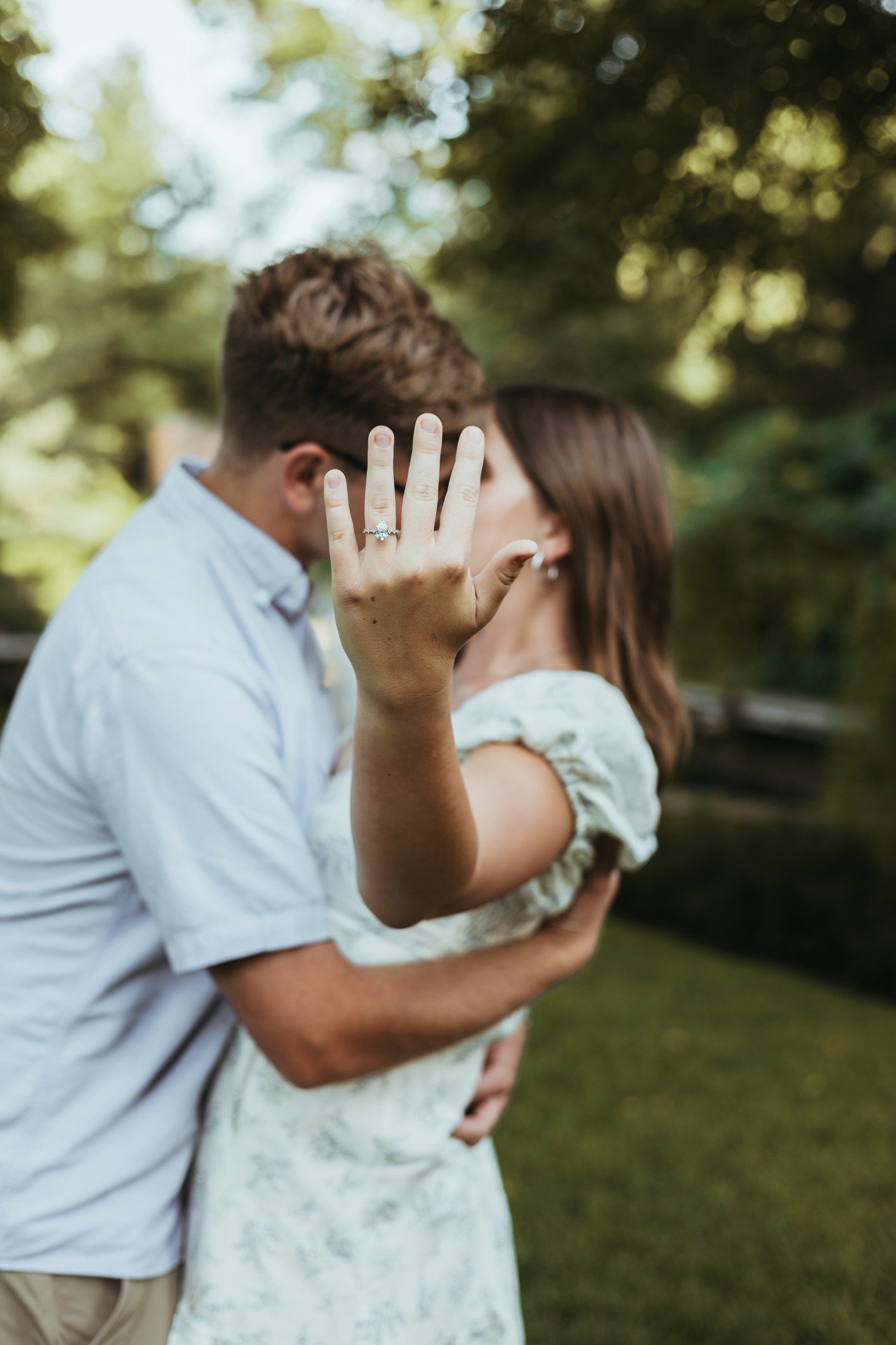 engagement photo showcasing engagement ring